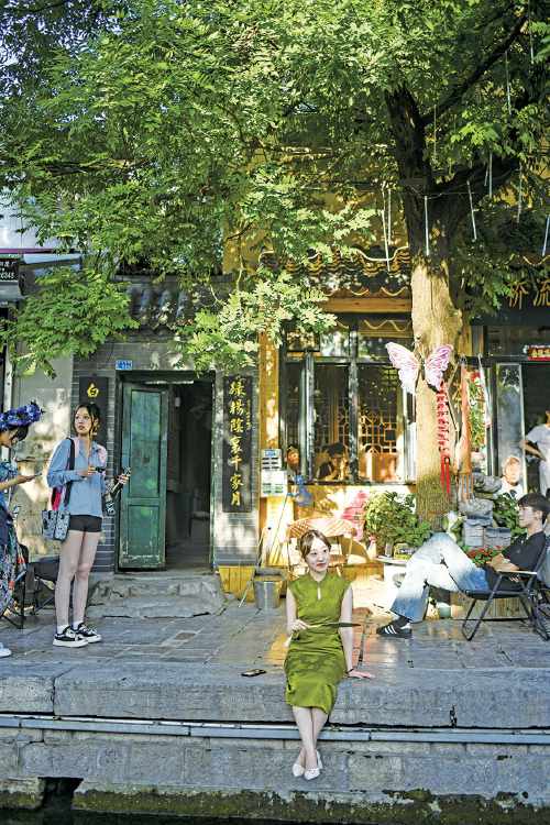 雨后“翻開”夏日畫卷 老街巷遇見詩(shī)意浪漫